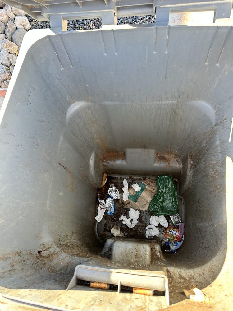 Inside of a dirty bin before cleaning